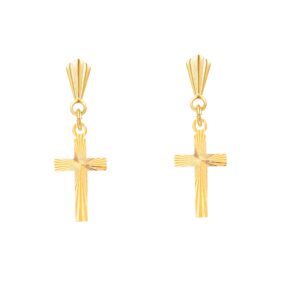 Close up of engraved diamond cut cross detail in yellow gold