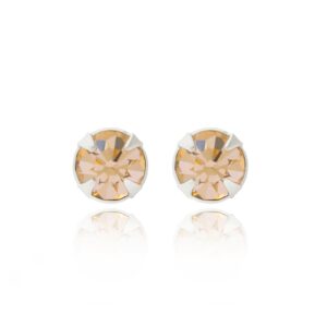 silver light orange crystal studs in Sterling Silver, pair shown front facing on a reflective white background