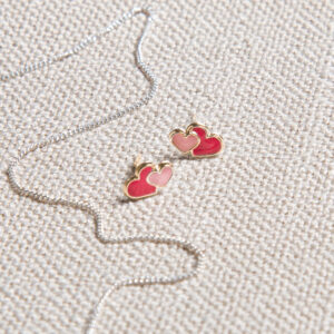 Gold red and pink enamel heart studs styled with silver chain