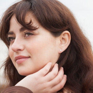 gold white cz heart studs pair with bright sparkle and polished gold setting